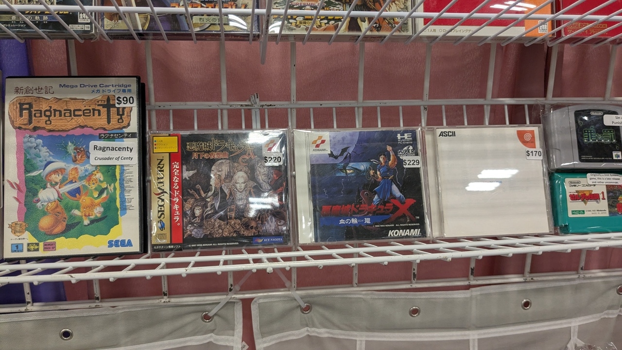 two Japan-only Castlevania games sitting on a shelf together. they’re very expensive at around $220 each.