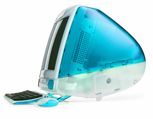 photo: a "blueberry" light blue-green iMac G3